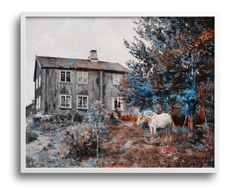 May include: A framed print of a rustic wooden house and a white horse in a field. The artwork has a vintage aesthetic with muted tones of brown, blue, and white. The house has multiple windows and a chimney.