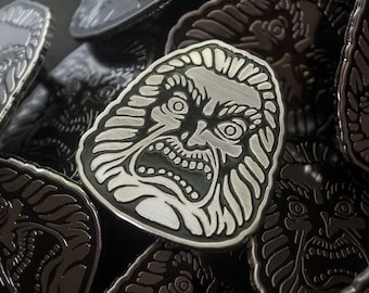 Zardoz Stone Head Enamel Pin