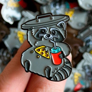 Snack Raccoon Enamel Pin