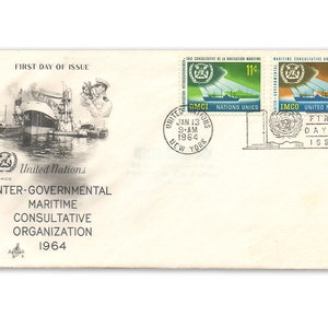 May include: First day of issue envelope for the Inter-Governmental Maritime Consultative Organization (IMCO) of the United Nations. The envelope features a black and white image of a ship and a sailor. The envelope has two stamps, one green and one brown, with the IMCO logo and the text "United Nations". The envelope also has a postmark from New York, dated January 13, 1964.