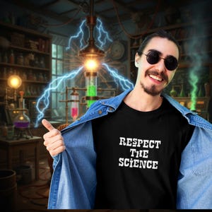 May include: Black t-shirt with the text "RESPECT THE SCIENCE" in white. The person in the image is wearing a denim jacket and sunglasses. The background features a laboratory setting with scientific equipment and electrical arcs.