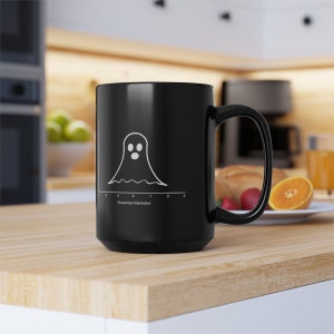 May include: Black coffee mug with a white ghost-shaped bell curve and the text "Paranormal Distribution".