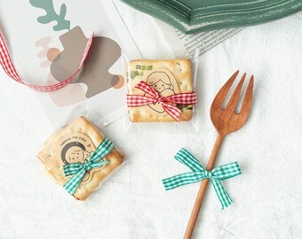 Rollen ginganglint voor cadeau- en bakkerijverpakkingen - 1 cm breed, rollen van 22 meter