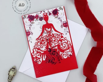 May include: Red laser cut invitation with a floral design and a silhouette of a woman in a dress. The invitation reads "MR. & MRS. CORDIALLY INVITE YOU TO CELEBRATE THE QUINCEAÑERA OF Aaliyah"