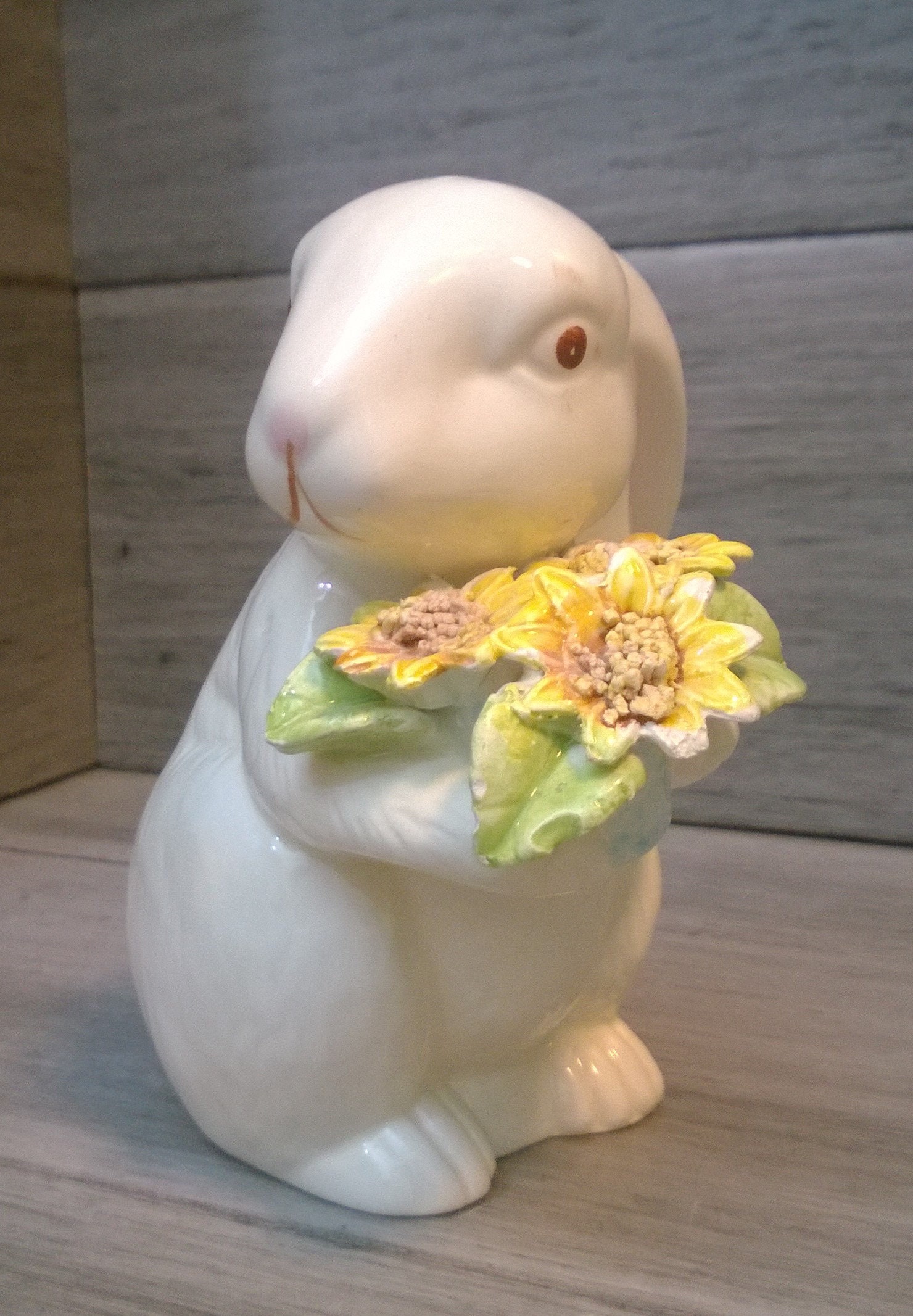 Holding a Blue Pot of Yellow Flowers Easter Vignette Vintage White Porcelain or Ceramic Easter Bunny or Rabbit Tabletop Decor Holding a Blue Pot of Yellow Flowers Easter Vignette Vintage White Porcelain or Ceramic Easter Bunny or Rabbit Tabletop Decor