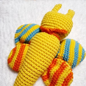 For the baby grasping toy butterfly in bright colors with squeaker in the wings image 1