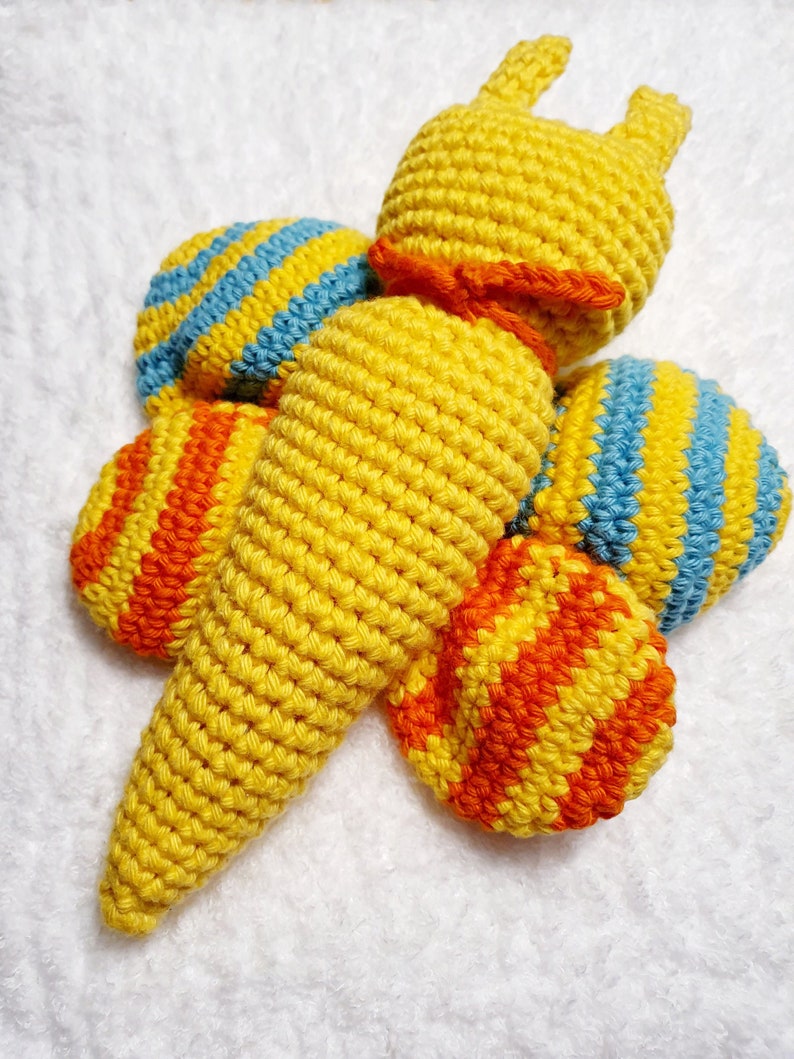 For the baby grasping toy butterfly in bright colors with squeaker in the wings image 1