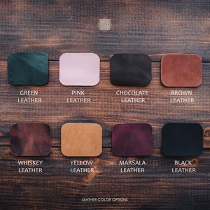 May include: Leather color options for a product.  The colors are: green, pink, chocolate, brown, whiskey, yellow, marsala, and black.