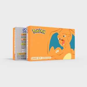 May include: A box for the Game Boy Advance video game Pokemon. The box is orange and features a cartoon image of the Pokemon Charizard. The text "Pokemon" is printed in black on the box. The text "Game Boy Advance" is printed in black on the bottom of the box.