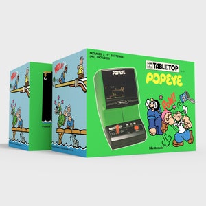 May include: A green and black handheld video game console with a screen showing a cartoon Popeye character. The console is labelled "Table Top Popeye" and "Nintendo". The box art features Popeye and Bluto characters.