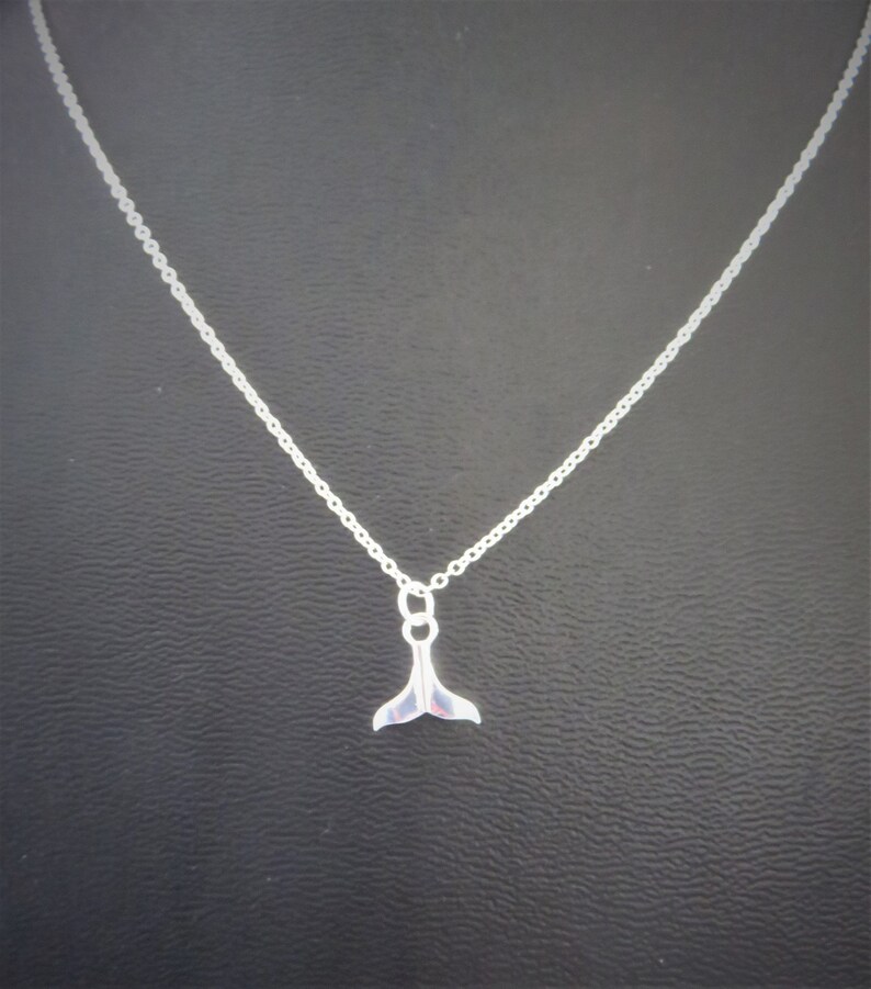 925 sterling silver chain and its 925 sterling pendant feather or whale tail