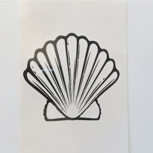 May include: A black and white illustration of a seashell. The seashell is a simple design with a rounded shape and a series of lines radiating from the center.