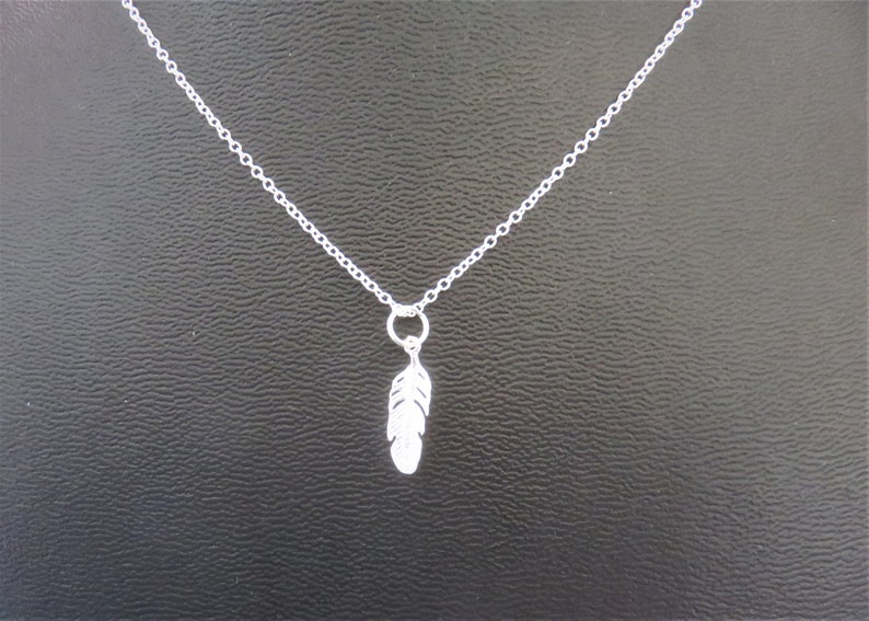 925 sterling silver chain and its 925 sterling pendant feather or whale tail