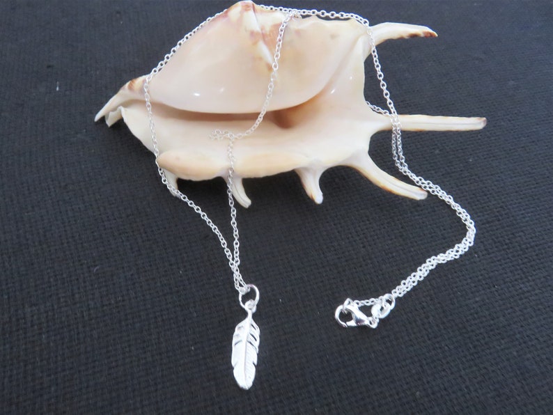925 sterling silver chain and its 925 sterling pendant feather or whale tail