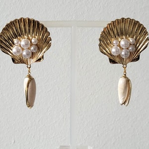 large earrings, shells, gold