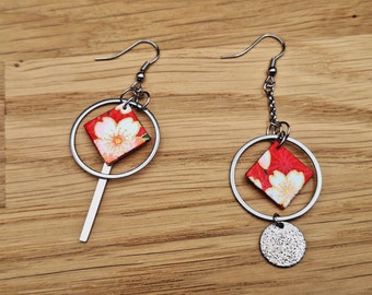 Different mismatched asymmetrical earrings in red silver