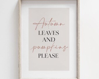May include: A light wood frame containing a rectangular print with a beige background. The text reads Autumn in a cursive script, LEAVES AND in a black serif font, pumpkins in a cursive script, and PLEASE in a black serif font.