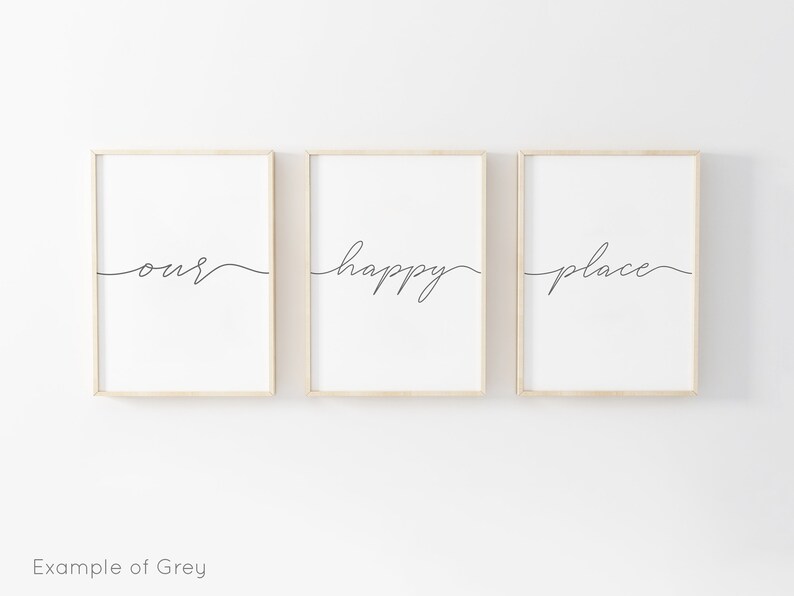 May include: Three framed prints with the words "our", "happy", and "place" written in a cursive font. The prints are hung on a white wall.