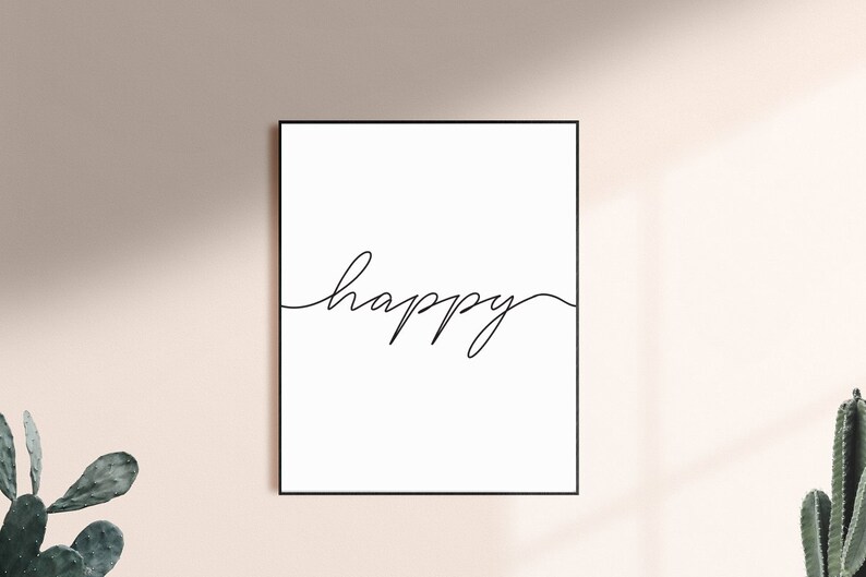 May include: A black framed print with the word "happy" written in a single continuous line in black ink on a white background.