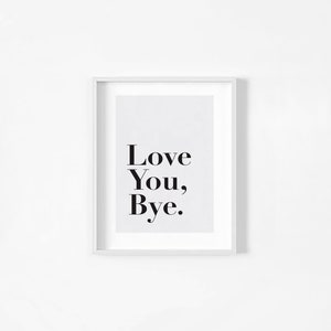 May include: A white framed print with the text "Love You, Bye." in black bold font on a light gray background.