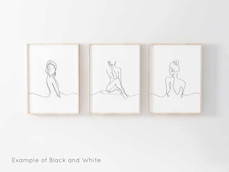 May include: Three black and white line drawings of women in various poses. The drawings are framed in simple wooden frames and are hung on a white wall.