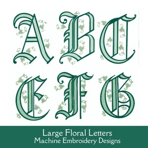 May include: Six large, green, floral letters, A, B, C, D, E, and F, in a gothic font style. The letters are outlined in a darker green and have a decorative floral design. The letters are arranged in two rows of three. The text "Large Floral Letters Machine Embroidery Designs" is at the bottom of the image.