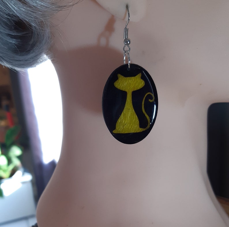 Handmade natural wood dangle earrings.