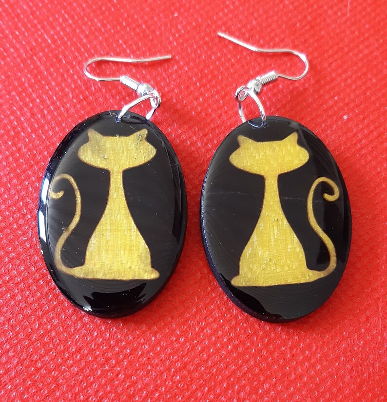 Handmade natural wood dangle earrings.