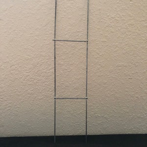 H- sign holder