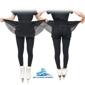 May include: Black figure skating skirt with a sheer overlay. The skirt is worn over black leggings and the model is wearing black ice skates.