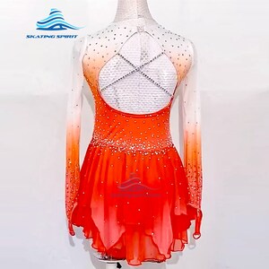 May include: Orange and white figure skating dress with long sleeves and a criss-cross back design. The dress is decorated with rhinestones and has a gradient effect.