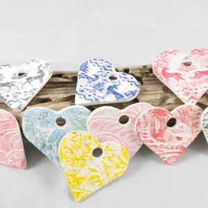 Hearts made of modeling clay Christmas tree decorations
