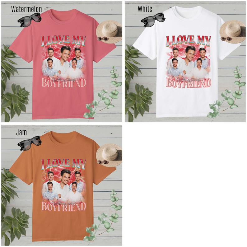 May include: Three t-shirts with the text "I Love My Boyfriend" in pink, white, and orange. The shirts feature a collage of photos of a boy band.