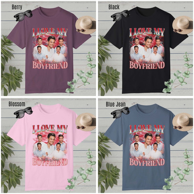 May include: Four different color t-shirts with a graphic print of a group of men with the text "I Love My Boyfriend" in red and white letters. The t-shirts are available in berry, black, blossom, and blue jean.