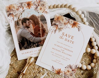 May include: Wedding stationery set featuring a photo card and a "Save the Date" card with floral accents. The cards have a warm color palette and include the names Scarlet and Michael, and the wedding date.