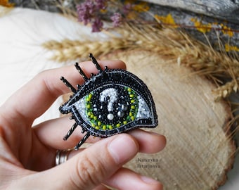 Grön ögonnål, ögonbrosch