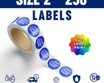 May include: A roll of 250 circular labels, each 2 inches in diameter, featuring the text 'YOUR DESIGN HERE' in white on a blue background. The image includes text stating 'SIZE 2" 250 LABELS', 'FULL COLOR PRINT', 'FAMILIY OWNED', 'FREE SHIPPING', '5 STAR REVIEWS', 'WATER PROOF', and 'FOOD SAFE'.