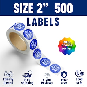May include: A roll of 500 circular labels, each 2 inches in diameter, featuring the text 'YOUR DESIGN HERE' in white on a blue background. The image includes text stating 'SIZE 2" 500 LABELS', 'FULL COLOR PRINT', 'FAMILIY OWNED', 'FREE SHIPPING', '5 STAR REVIEWS', 'WATER PROOF', and 'FOOD SAFE'.