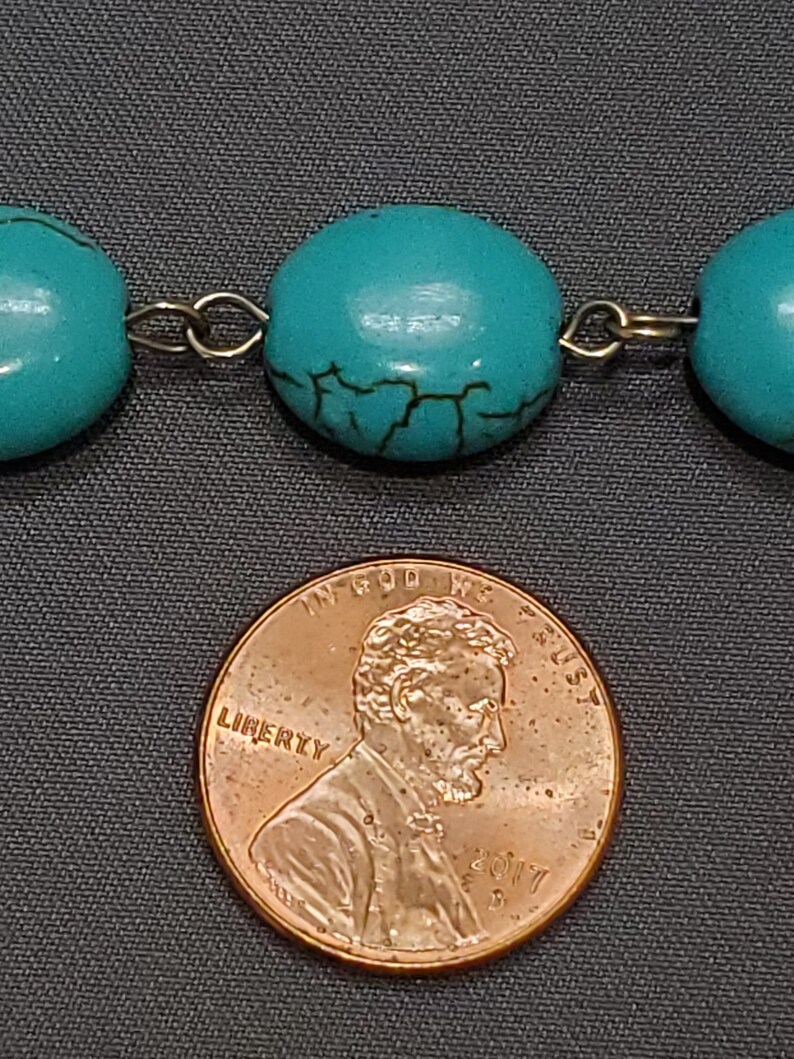Turquoise Beaded Necklace with Bronze Amulet