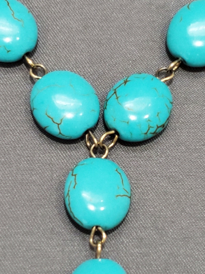 Turquoise Beaded Necklace with Bronze Amulet