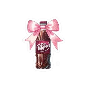May include: A pink glittery bow tied around a brown glass bottle of Dr Pepper soda.