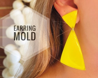 Mold for earringsin the form of triangles