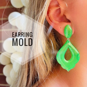 Silicone mold for making epoxy resin earrings.