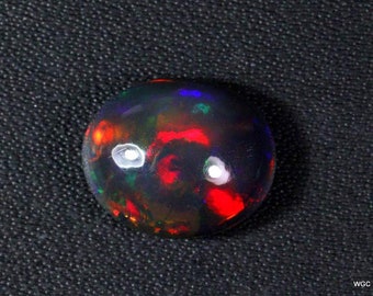 AAA Grade Black Opal Cabochon Gemstone + Flashy Fire Black Opal + Handmade Oval Shape Opal + October Birthstone Gemstone, Taille 12x10x6 MM.