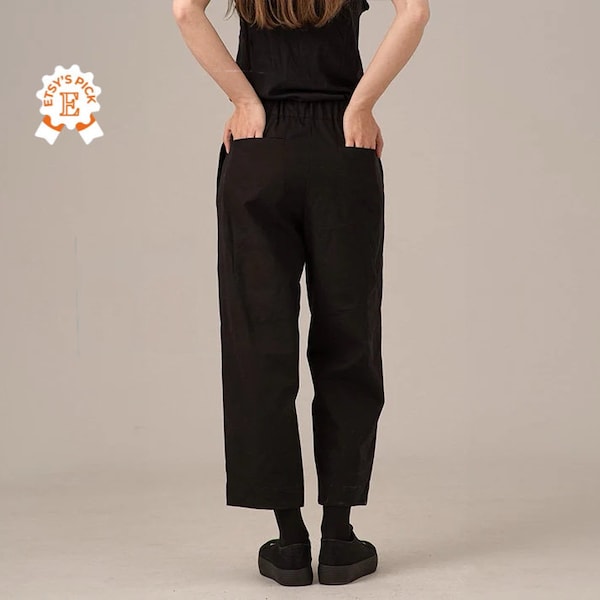 Minimalistische Hose mit lockerem Bein, weit geschnittene Ballonhose, schwarze Gaucho-Hose im japanischen Stil, entspannte Sommerhose mit Falten