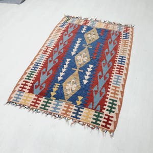 Vintage Turkish Kilim Rug: 3.6x5.6 ft, Handmade Wool Anatolian Area Rug