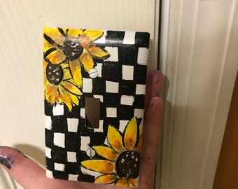 checkered with sunflowers