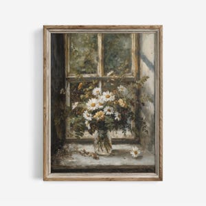 May include: A framed painting shows a still life of daisies in a glass jar on a windowsill. The artwork has a vintage aesthetic, with a wooden frame and soft colour palette. The window is visible in the background, with greenery outside.