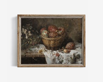 May include: A framed still life painting featuring a woven basket filled with decorated eggs. The eggs are various shades of red and brown, with floral patterns. The basket sits on a white cloth with floral designs, alongside flowers and nuts.