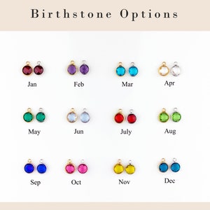 May include: Birthstone options for jewelry making.  Each month of the year is represented by a different color gemstone.  The gemstones are displayed on a white background.